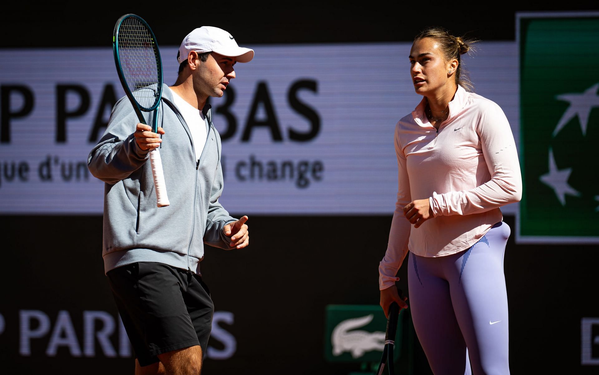 Anton Dubrov (left) and Aryna Sabalenka (right) during a training session at the 2025 French Open (Source: Getty)